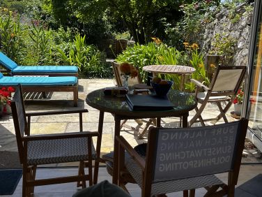 View of the Sea Breeze Garden with the bifold doors open.