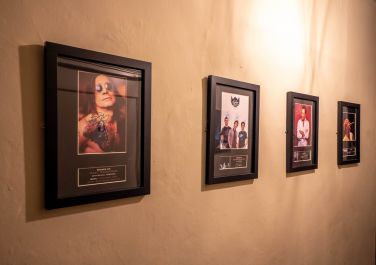 Singed pictures on a picture wall Monnow Valley Studios Monmouthshire