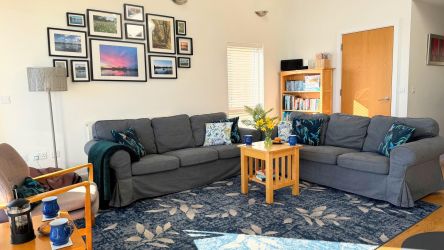 The open plan living room with log burner.