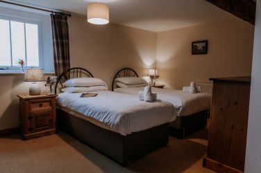 One of the three bedrooms which can be arranged as either doubles or twins