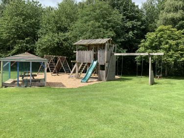 Low Costa Mill playpark with swings, slides, climbing and sandpit