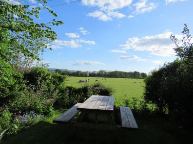 Picnic at the end of the garden, overlooking the meadows.