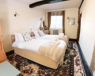 The optional 3rd bedroom, The Oak Room, can have a twin beds or a superking bed.