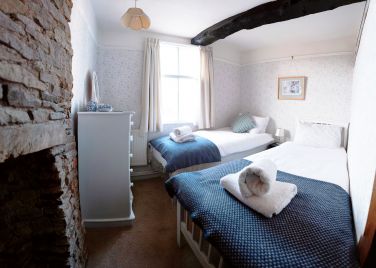 The Blue and White Room: a choice of single, small twin or single with cot.