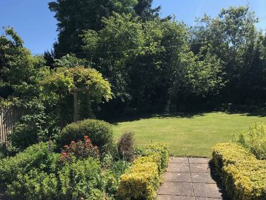 South facing enclosed garden with large lawn