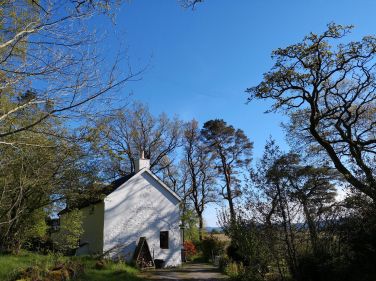 As you turn in from the road