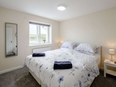 Quiet and calm main bedroom overlooking the river estuary