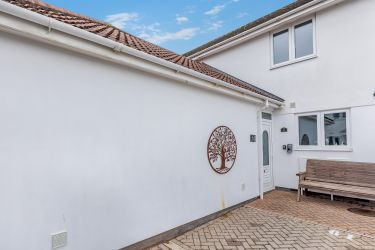 The front with its off-road parking space