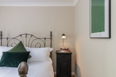 Calm and tranquil styling throughout in the courtyard bedroom