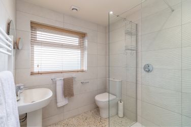 A large walk-in shower and underfloor heating make getting up a pleasure!