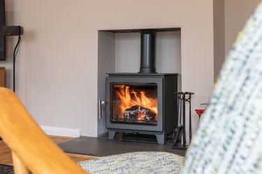 Our lovely bespoke log burner will ensure you keep toasty on cooler evenings