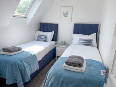 Bedroom 3 with single beds