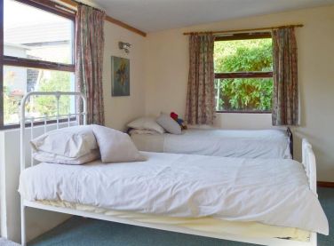 Bedroom  looks out onto garden