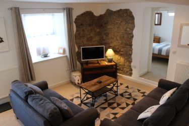 Living room looking out towards centre of village