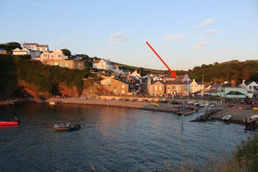 The village at high tide.  The arrow points to The Nest, just 100 yards from the beach.