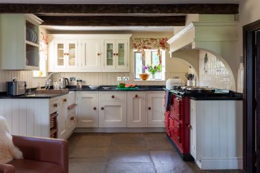 Kitchen, there is also an adjoining food preparation and storage room