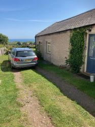 Car parking at the side of the cottage