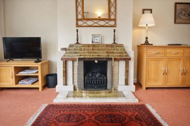 Gas "coal" fire operated by remote control