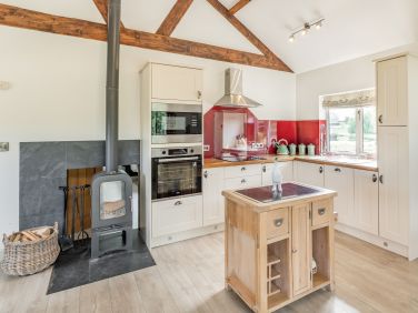 Open-plan, well equipped kitchen
