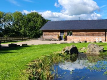 Front entrance with feature pond