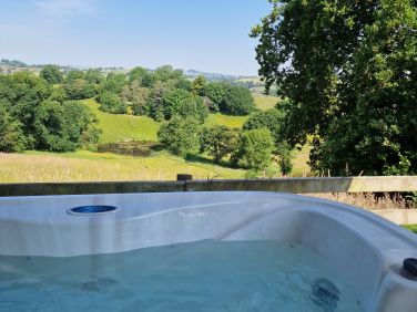 View of Welsh countryside from the hot tub at Cwtch