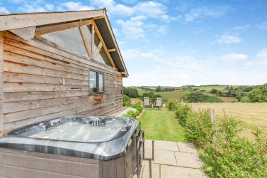Private outdoor hot tub at Oakview