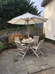 Enjoy tea in the small enclosed garden