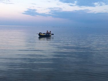 Kayaking on the calm summer sea