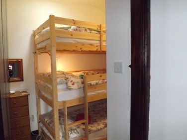 The triple bunk room