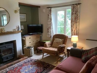 Sitting room showing log burner