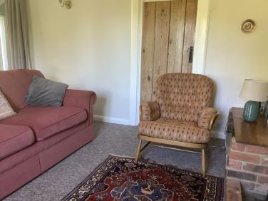 Sitting room with door to utility room and cloak room