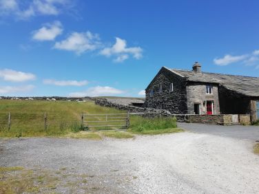 Parking and turning area in front of the cottage.