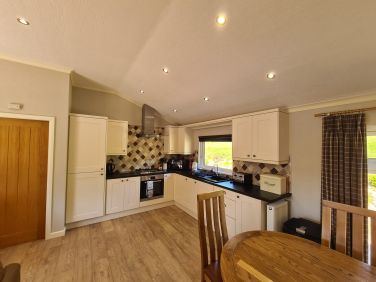 The open plan kitchen and dining area.
