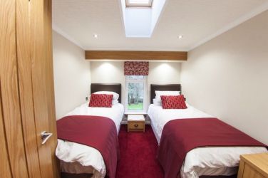 The twin bedroom is comfy and spacious.