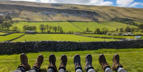 Walking the dales with friends or family. View near Kettlewell