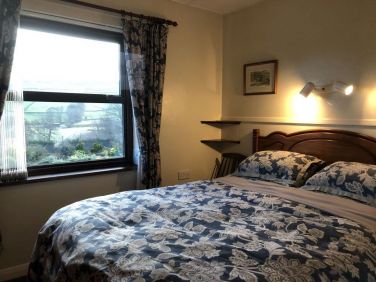 King size bed with Dorma bedding and fantastic views