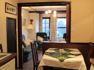Beechcroft dining area with double sliding doors to lounge