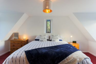 First floor family bedroom. Double aspect with sea views. Big super-king sized bed plus a single bed