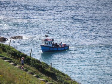 Fishing boats regularly visit the tranquil bay of Talland