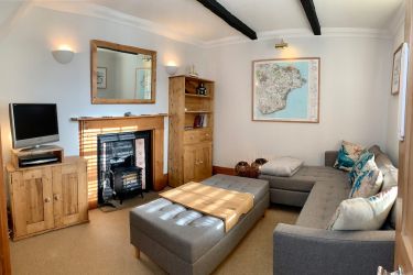 Cosy lounge with TV, DVD, games, maps and guide books