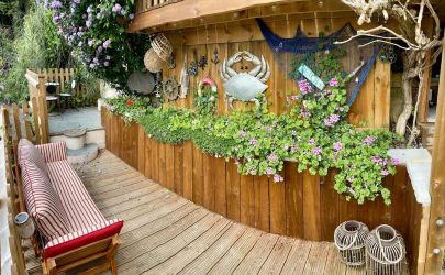 The lower terrace with comfy day sofa