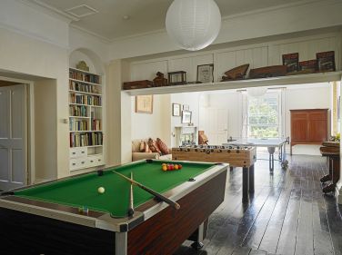 The games room with pool table, table football & table tennis