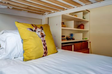 Bunk bedroom on the first floor - I love the cushions!
