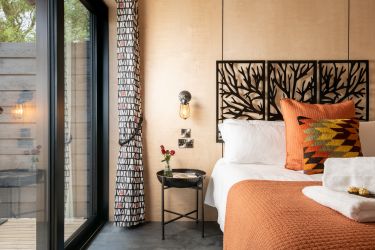 Bedroom with view to private decking area