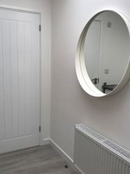 Utility area leading to bathroom 1
