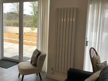 Doors to garden with country views