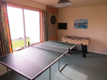 Games room: table tennis, darts, and table football