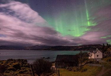 Aurora borealis over Shore Cottage