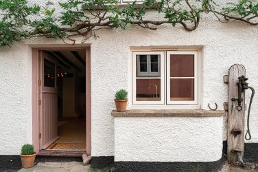 Old Malt House entrance.  The old well pump still works.