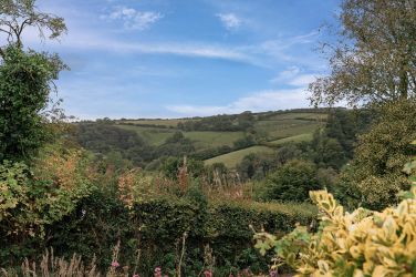 Delightful countryside views from the garden.  A lovely place for al fresco dining.